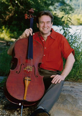 Steven Honigberg sitting with cello